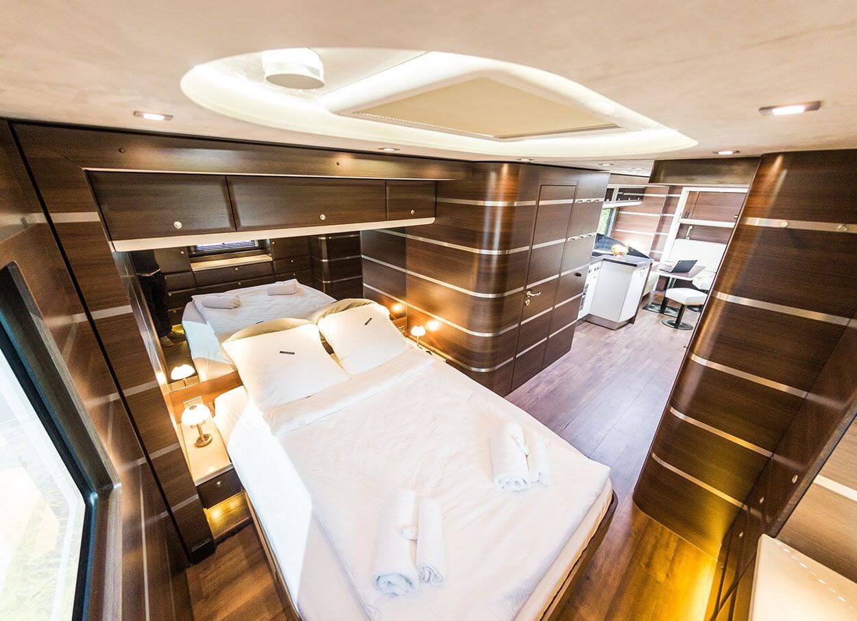 Bedroom in an exclusive motorhome by eila